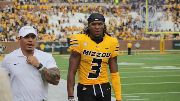 Breaking News: Luther Burden III, one of the top-rated wide receivers in the country, has officially decommitted from the University of Missouri, creating a ripple effect in the college football recruiting world. Burden, a 5-star recruit from East St. Louis, Illinois, had previously pledged his commitment to Mizzou in 2022, but after careful consideration and weighing his options, he has flipped his commitment to the Texas Longhorns… Read more